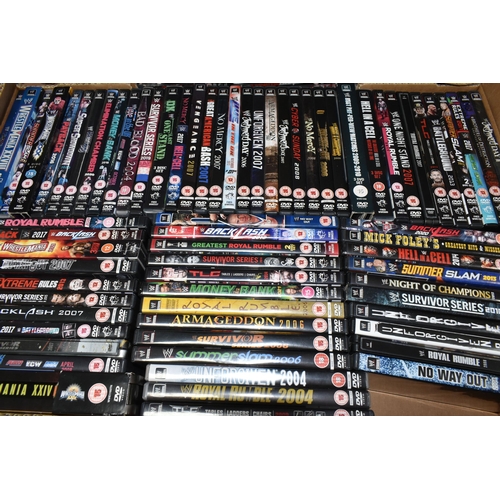 395 - FOUR BOXES OF DVD FILMS, over two hundred, to include mostly World Wrestling Championships and Wrest... 