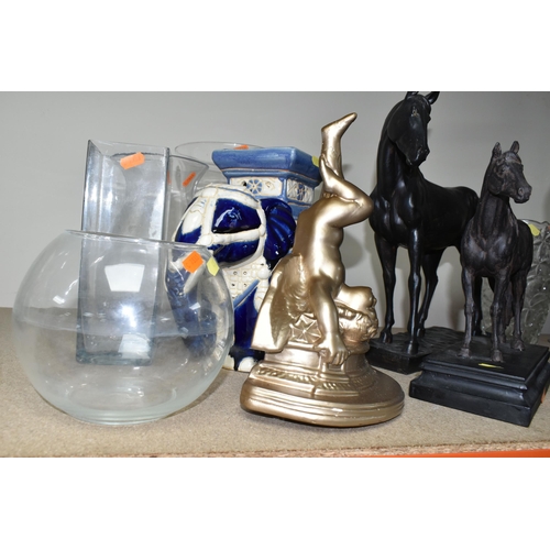 418 - A GROUP OF FIGURES, GLASS WARES, ETC, to include a bronzed resin Austin Sculpture of a cowboy on his... 