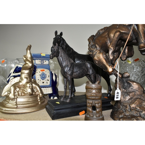 418 - A GROUP OF FIGURES, GLASS WARES, ETC, to include a bronzed resin Austin Sculpture of a cowboy on his... 