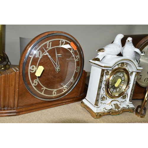 426 - A COLLECTION OF SEVEN MANTEL CLOCKS, comprising a large 1930s style wooden cased Westminster chimes ... 