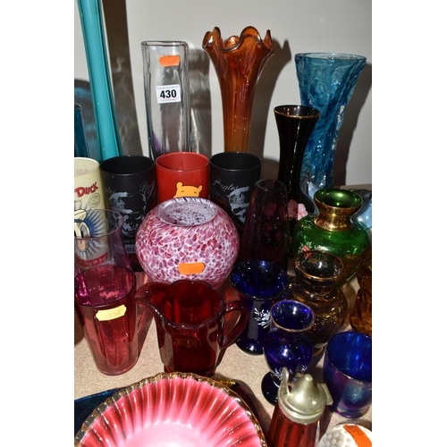 430 - A QUANTITY OF COLOURED GLASSWARE, a Ravenshead clear bark glass vase, height 17cm, a cranberry glass... 