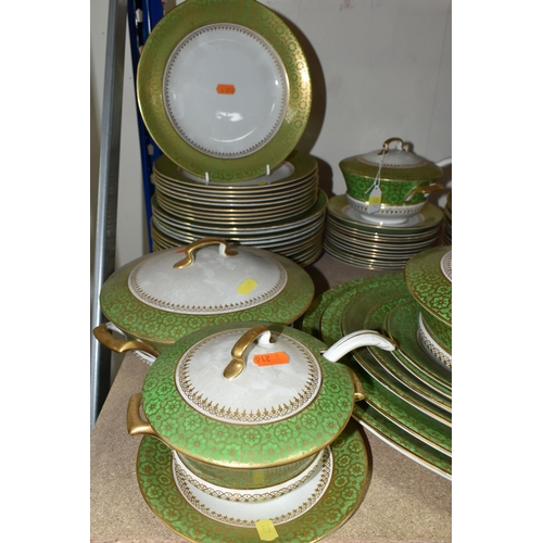 432 - A QUANTITY OF ASHWORTH BROTHERS IRONSTONE DINNERWARE, decorated with a vivid green band with gilt de... 