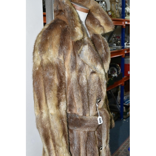 439 - A LADIES BELTED FUR COAT, light brown fur, button detail on cuffs, belted, approximately UK size 12/... 