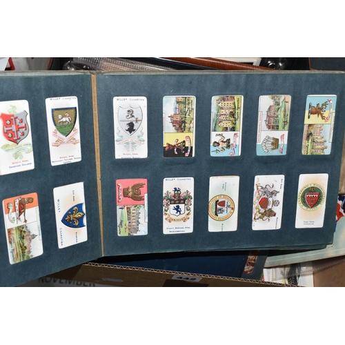 442 - ONE BOX Of CIGARETTE CARDS in six albums and loose containing a miscellaneous collection of sets, pa... 