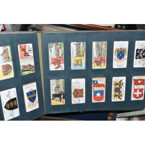 442 - ONE BOX Of CIGARETTE CARDS in six albums and loose containing a miscellaneous collection of sets, pa... 