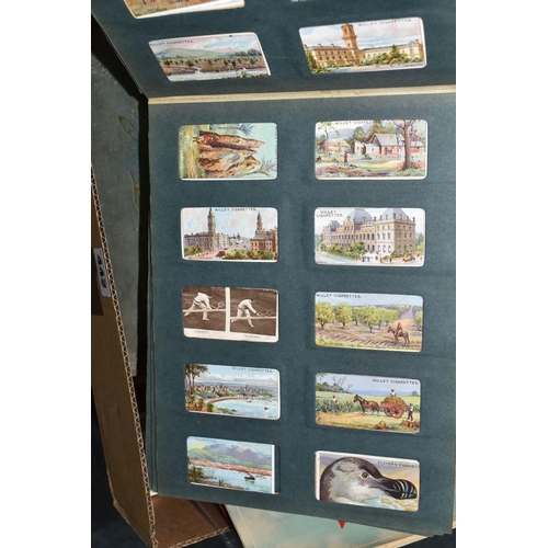 442 - ONE BOX Of CIGARETTE CARDS in six albums and loose containing a miscellaneous collection of sets, pa... 