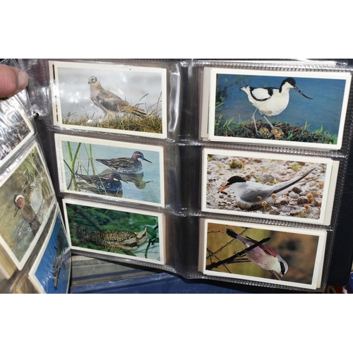 442 - ONE BOX Of CIGARETTE CARDS in six albums and loose containing a miscellaneous collection of sets, pa... 