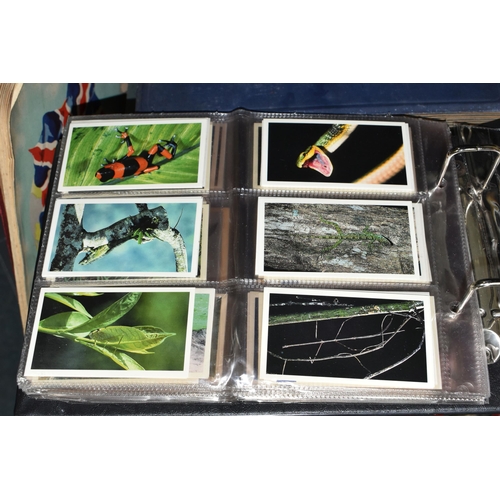 442 - ONE BOX Of CIGARETTE CARDS in six albums and loose containing a miscellaneous collection of sets, pa... 