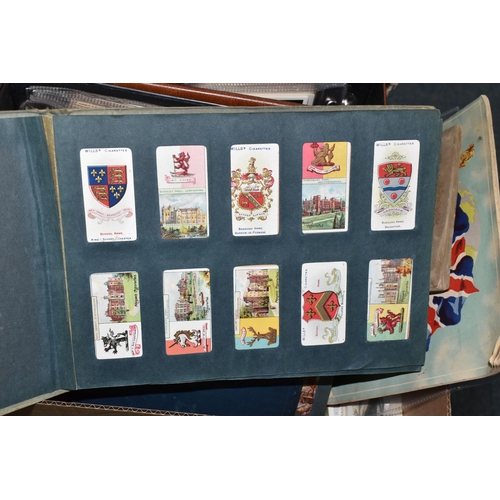 442 - ONE BOX Of CIGARETTE CARDS in six albums and loose containing a miscellaneous collection of sets, pa... 