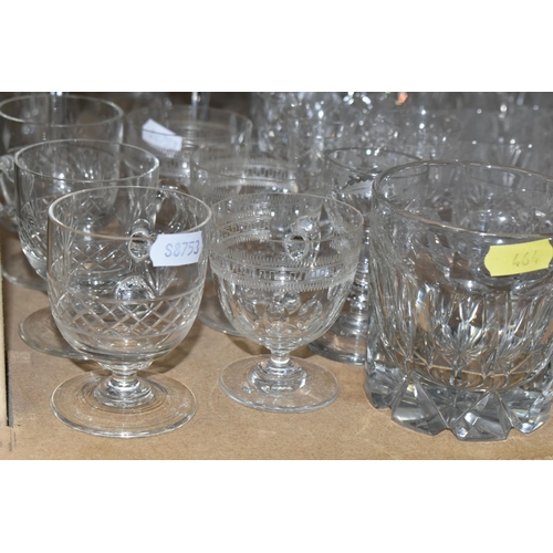 464 - A QUANTITY OF CUT CRYSTAL AND GLASSWARE, comprising mid- century smoked glass decanters, three other... 