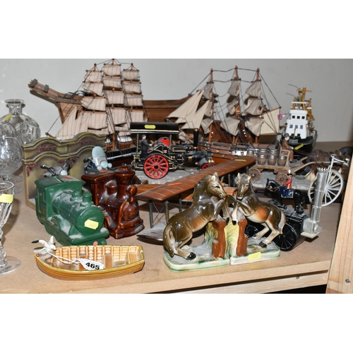 465 - A GROUP OF LARGE ORNAMENTS AND BOOK-ENDS, comprising a mid-century Wade porcelain fishing boat and s... 