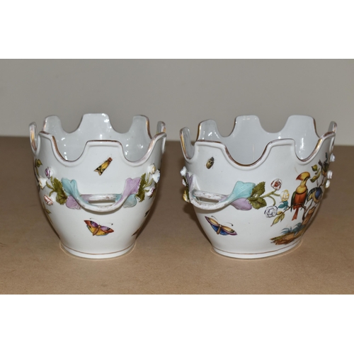 484 - A PAIR OF LATE 19TH / EARLY 20TH CENTURY CONTINENTAL PORCELAIN TWIN HANDLED CACHE-POT PLANTERS, the ... 