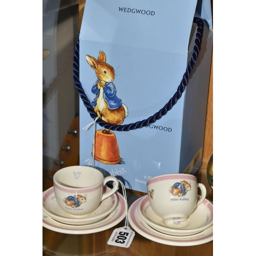 503 - A BOXED WEDGWOOD PETER RABBIT SIX PIECE NURSERY TEA SET, comprising two cups, two saucers and two te... 