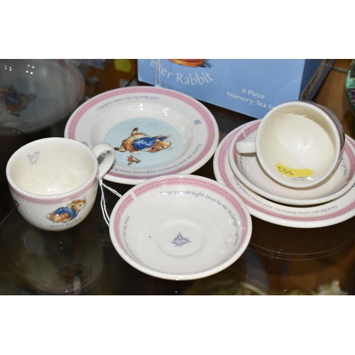 503 - A BOXED WEDGWOOD PETER RABBIT SIX PIECE NURSERY TEA SET, comprising two cups, two saucers and two te... 