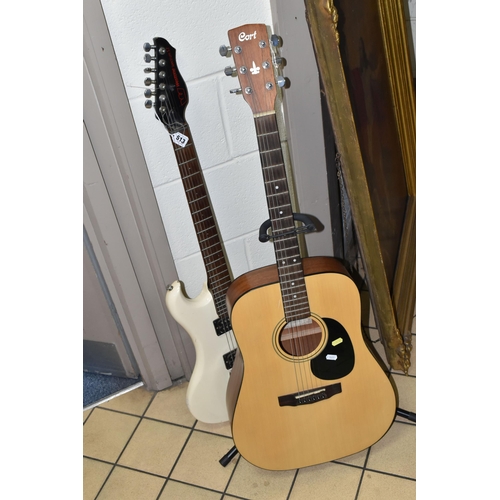 513 - TWO GUITARS, comprising a Cort  acoustic classical guitar, model AD830 NS, serial No. 080814316, wit... 