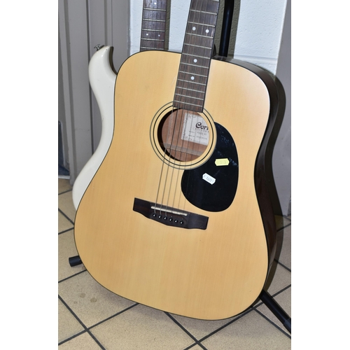 513 - TWO GUITARS, comprising a Cort  acoustic classical guitar, model AD830 NS, serial No. 080814316, wit... 