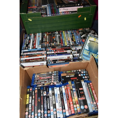 570 - FOUR BOXES OF DVDS AND BLU-RAYS, some sealed, to include feature films, TV box sets, music, sport an... 