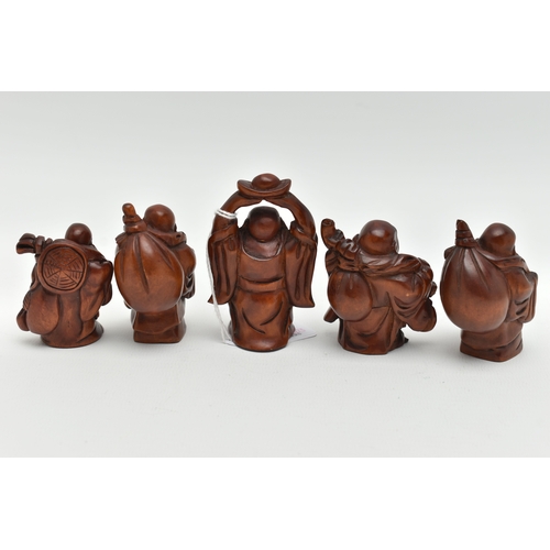 93 - FOUR 20TH CENTURY CARVED TREEN OKIMONO AND A NETSUKE, all in the form of standing buddha, all with i... 