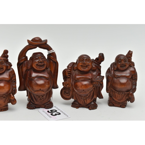 93 - FOUR 20TH CENTURY CARVED TREEN OKIMONO AND A NETSUKE, all in the form of standing buddha, all with i... 