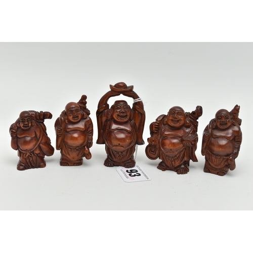 93 - FOUR 20TH CENTURY CARVED TREEN OKIMONO AND A NETSUKE, all in the form of standing buddha, all with i... 