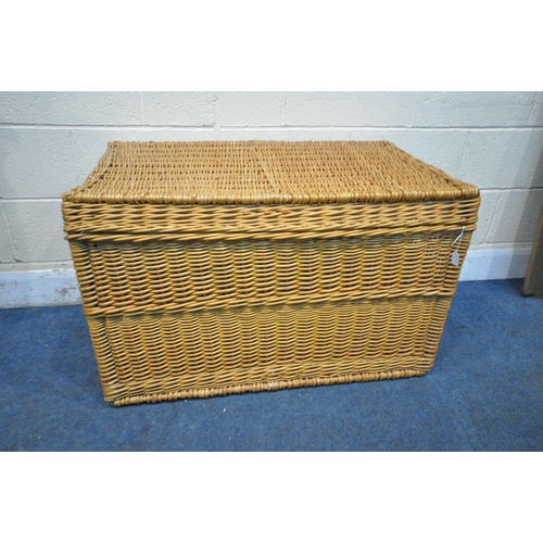 1202 - A LARGE RECTANGULAR WICKER BASKET, with hinged lid and twin handles, width 104cm x depth 59cm x heig... 