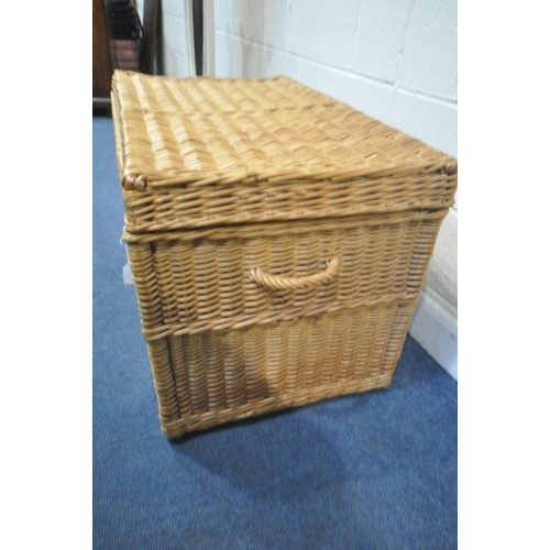 1202 - A LARGE RECTANGULAR WICKER BASKET, with hinged lid and twin handles, width 104cm x depth 59cm x heig... 