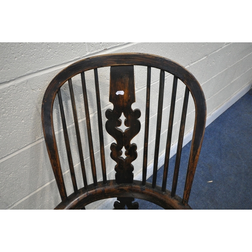 1203 - A 19TH CENTURY STAINED ELM WINDSOR ARMCHAIR, with spindled back rest, turned supports, legs and stre... 