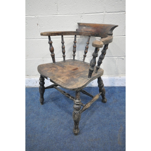 1204 - A 19TH CENTURY ELM AND BEECH BOW TOP CAPTAINS CHAIR, with spindled supports, turned legs and stretch... 