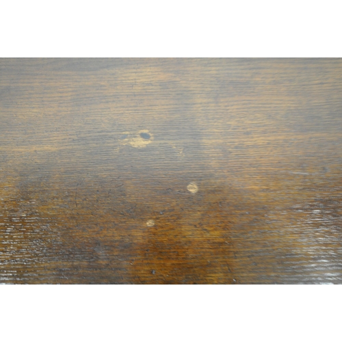 1207 - A TITCHMARSH AND GOODWIN OAK REFECTORY TABLE, om turned and carved bulbous legs, united by a block s... 