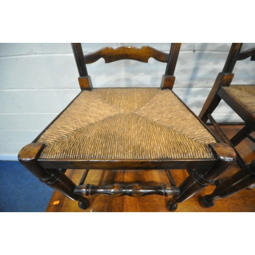 1219 - IN THE MANNER OF TITCHMARSH AND GOODWIN, AN OAK DRAW LEAF TABLE, on turned and block legs, united by... 