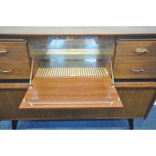 1241 - A MID CENTURY BEAUTILITY TOLA AND BLACK HIGHBOARD, fitted with two banks of two drawers, flanking a ... 