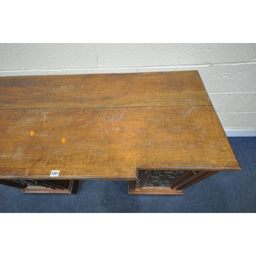 1247 - AN EDWARDIAN WALNUT BREAKFRONT SIDEBOARD, with a single drawer and two cupboard door, surrounding a ... 