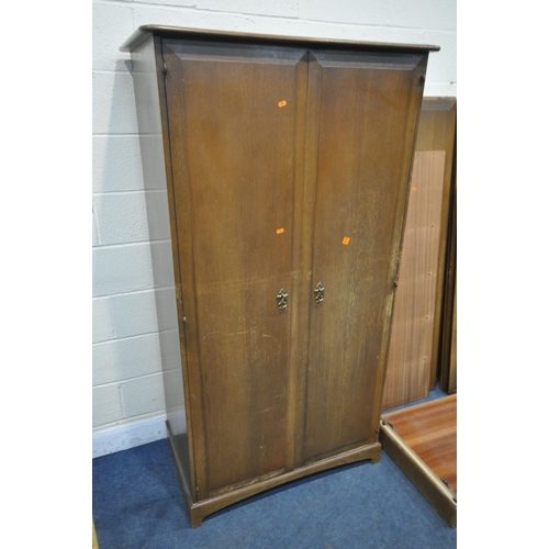 1248 - A STAG MADRIGAL THREE PIECE BEDROOM SUITE, comprising two double door wardrobes, larger wardrobe dis... 