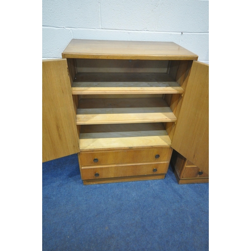 1249 - A 20TH CENTURY OAK TWO PIECE BEDROOM SUITE, comprising a tallboy with two cupboard doors, above two ... 