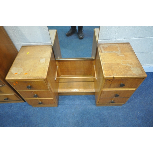 1249 - A 20TH CENTURY OAK TWO PIECE BEDROOM SUITE, comprising a tallboy with two cupboard doors, above two ... 