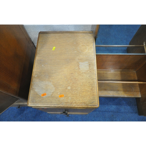 1249 - A 20TH CENTURY OAK TWO PIECE BEDROOM SUITE, comprising a tallboy with two cupboard doors, above two ... 