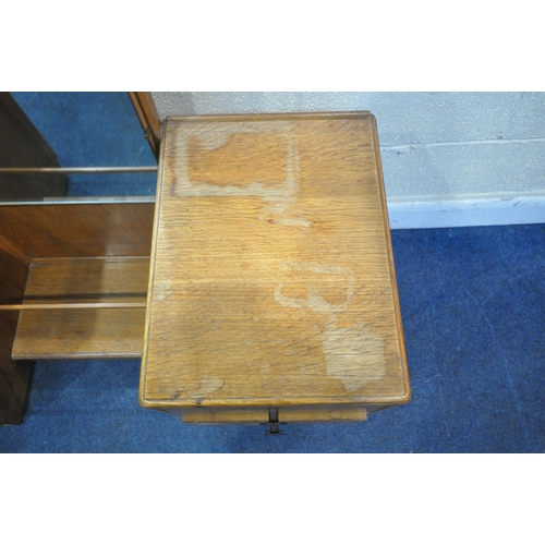 1249 - A 20TH CENTURY OAK TWO PIECE BEDROOM SUITE, comprising a tallboy with two cupboard doors, above two ... 