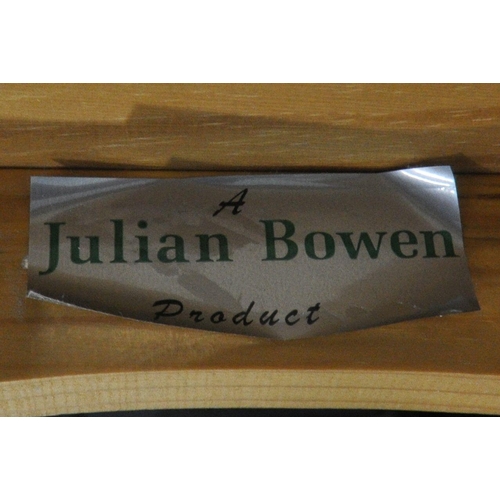 1250 - A JULIEN BOWEN PINE THREE PIECE BEDROOM SUITE, comprising a chest of two short over four long drawer... 
