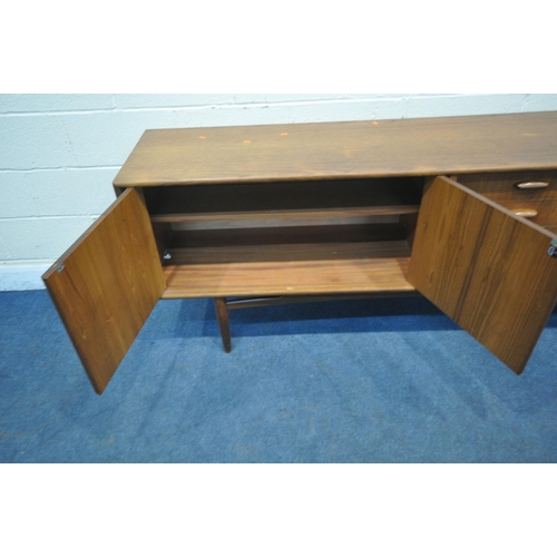 1251 - A MID CENTURY TEAK G PLAN SIDEBOARD, fitted with double cupboard doors, four recessed drawers, top d... 