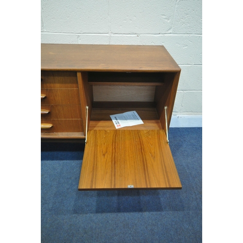 1251 - A MID CENTURY TEAK G PLAN SIDEBOARD, fitted with double cupboard doors, four recessed drawers, top d... 