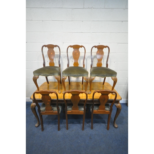 1273 - A QUEEN ANNE STYLE WALNUT DINING TABLE, with rounded ends, on cabriole legs, along with a set of six... 