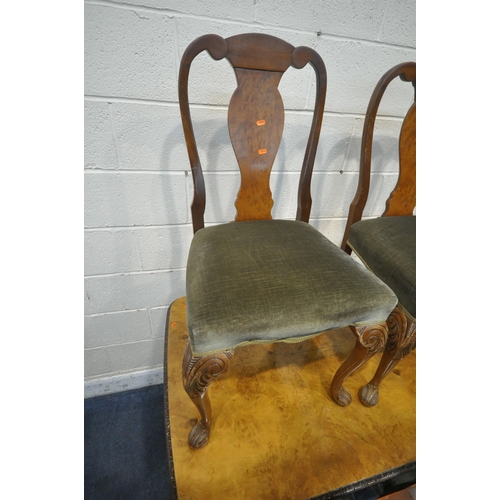 1273 - A QUEEN ANNE STYLE WALNUT DINING TABLE, with rounded ends, on cabriole legs, along with a set of six... 