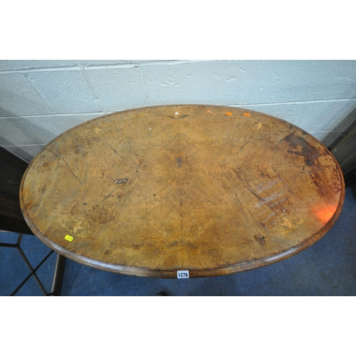 1276 - A VICTORIAN BURR WALNUT TILT TOP LOO TABLE, on a turned pillar support, for legs and castors, legs c... 