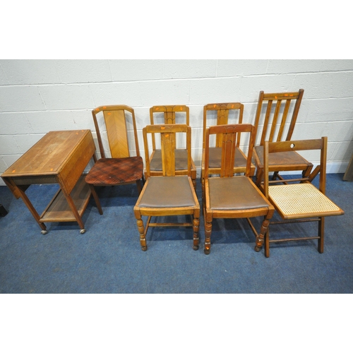 1278 - A 20TH CENTURY OAK DROP LEAF TROLLEY, a set of four oak dining chairs, with brown leather drop in se... 