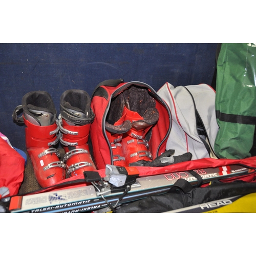 1060 - A COLLECTION OF SKIING EQUIPMENT including Head and Blizzard skis, three pairs of boots by Lange, Pr... 