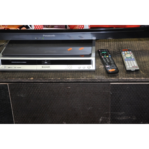 1077 - A PANASONIC TX42E30B 42in TV with remote and a DMR-EZ25 DVD player and remote (U81 error message) (b... 