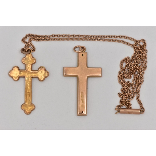 16 - TWO CRUCIFIX PENDANTS AND A CHAIN, both pendants stamped 9ct, both fitted with jump rings, length 35... 