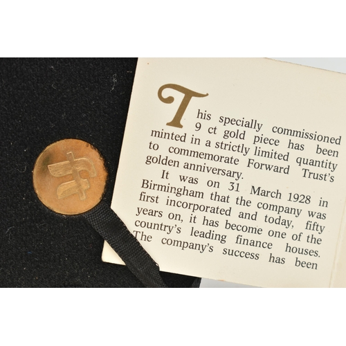 20 - A BOXED 9CT GOLD COMMEMORATIVE TOKEN, commemorating 'Foward Trusts Golden Anniversary' of Fifty Help... 