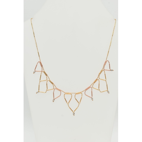 25 - A BI-COLOUR FRINGE NECKLACE, the faceted and tubular design chain suspending triangular fringe drops... 