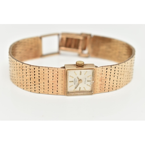 26 - A 1960'S 9CT GOLD ROTARY WRISTWATCH, the square face with gold coloured baton markers, signed Rotary... 